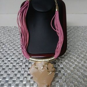 pink, gold and beige multi-strand neckalce